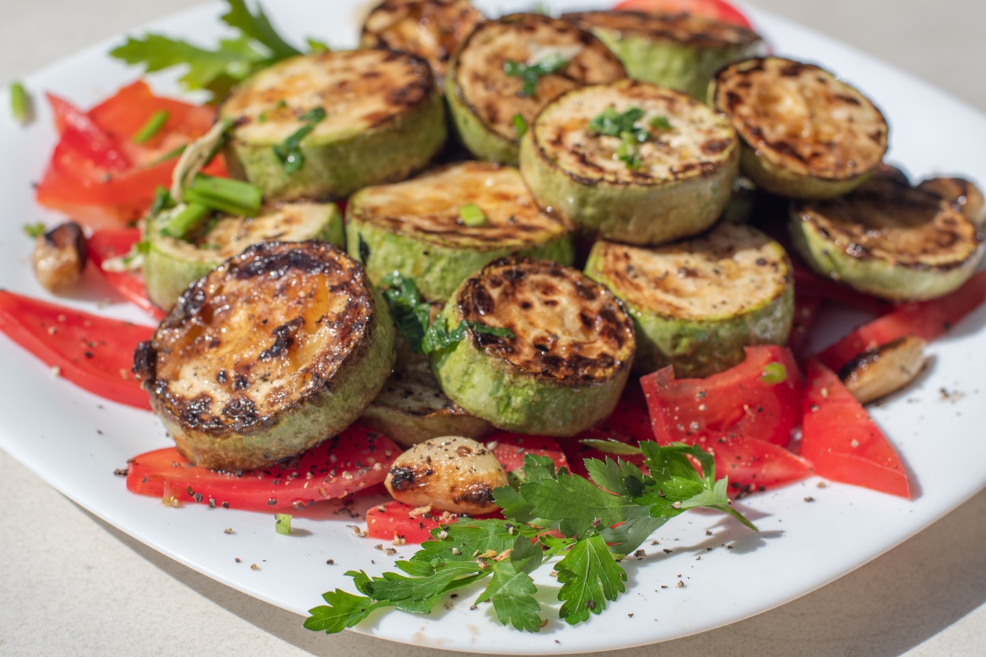 a white plate topped with lots of veggies